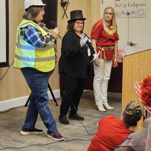 1-17-25 - DEC in Palmdale - Program Fair - National Security and Community Service host a game of Jeopardy while the audience sings the theme song, doot doot doot doot...