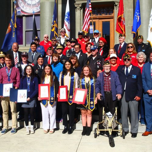 11-11-23 - Veterans Day Ceremony, November 11, 2023. Post 105 Family hosted their annual Veterans Day Ceremony at Redwood City's Courthouse Square. Auxiliary members (in red) and Girls State Citizens (wearing stoles) were included in the program. In attendance were Congressman Kevin Mullin, State Senator Josh Becker, Redwood City Council members, and U105's Stacy Jimenez (also a Foster City Councilwoman).